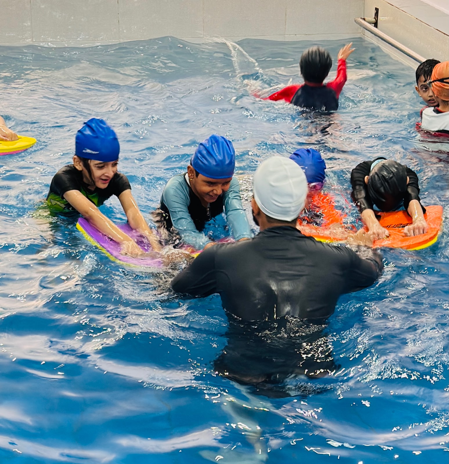 Students participating in swimming activities